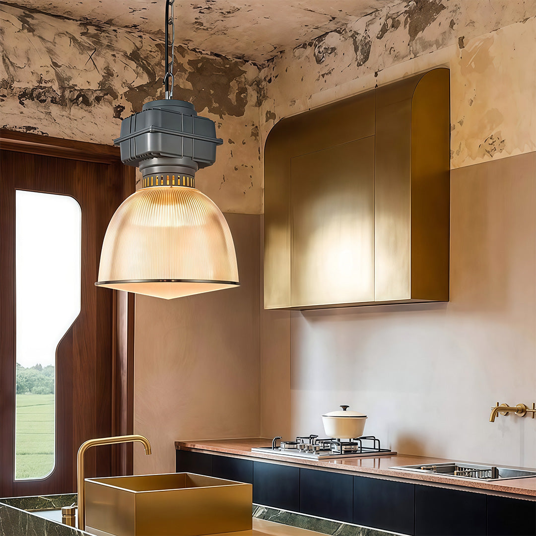 Industrial style pendant lighting installed in commercial bakery space with warm ambient glow effect