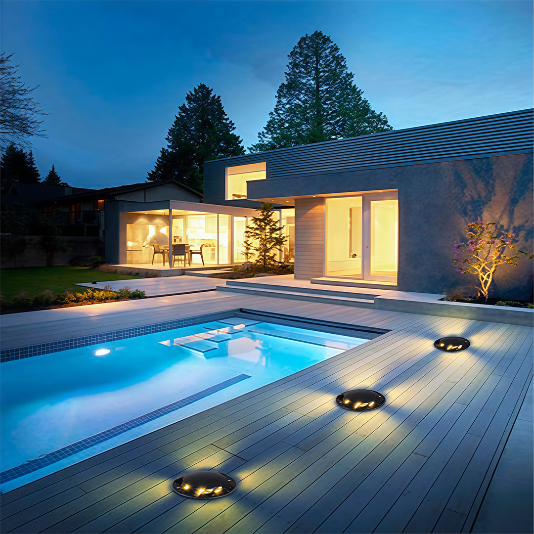 Close-up view of black cylindrical ground fixture showing precision-engineered directional design