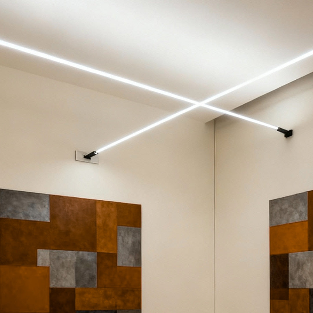 Intersecting led lights strips for room glowing on a modern wall with textured brown panels ok.