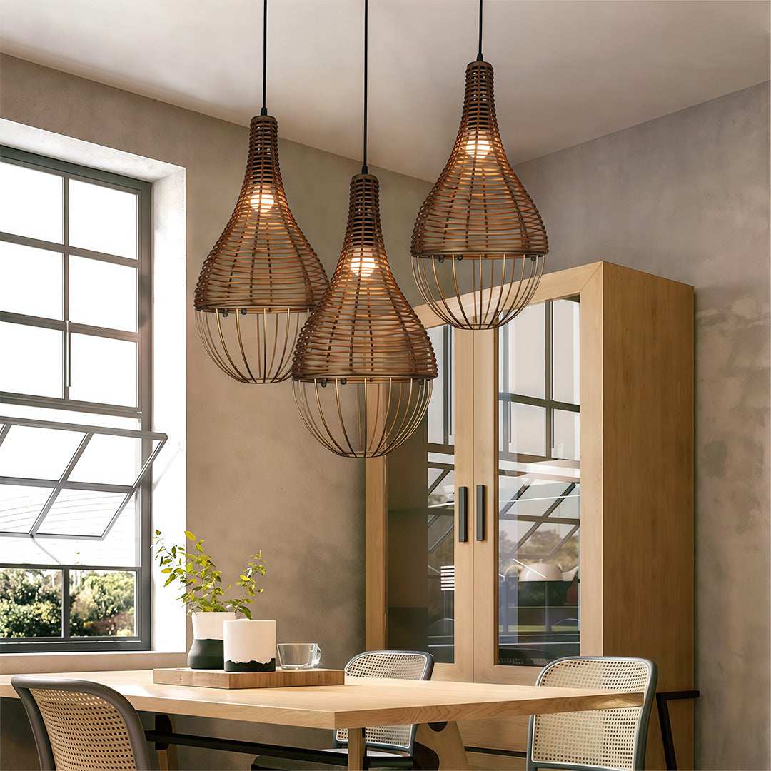 Close-up of an intricately woven rattan pendant light shade, emphasizing its unique and organic design.