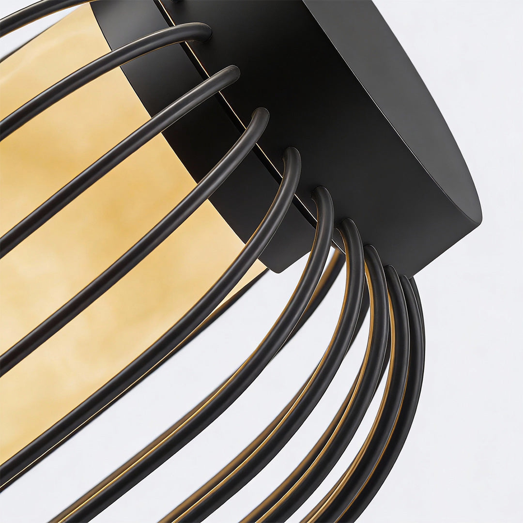 Close-up of lantern metal outdoor light showcasing intricate slat design and warm internal illumination.
