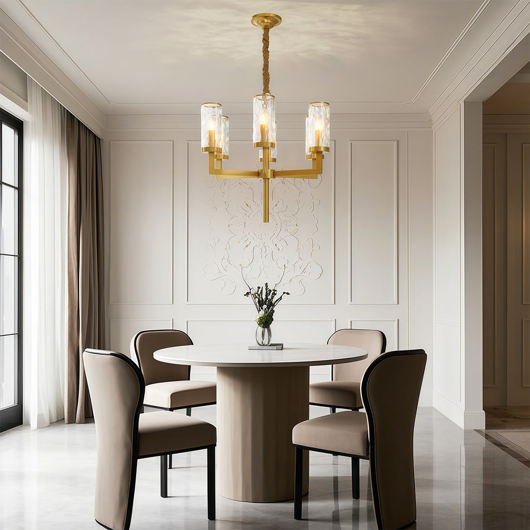 Modern luxury chandeliers illuminating elegant dining room with round dark wood table