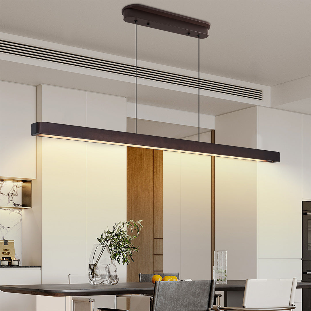 Add warmth to your kitchen with island linear pendant lighting in dark wood finish, offering stylish, efficient illumination and a sleek, modern design.