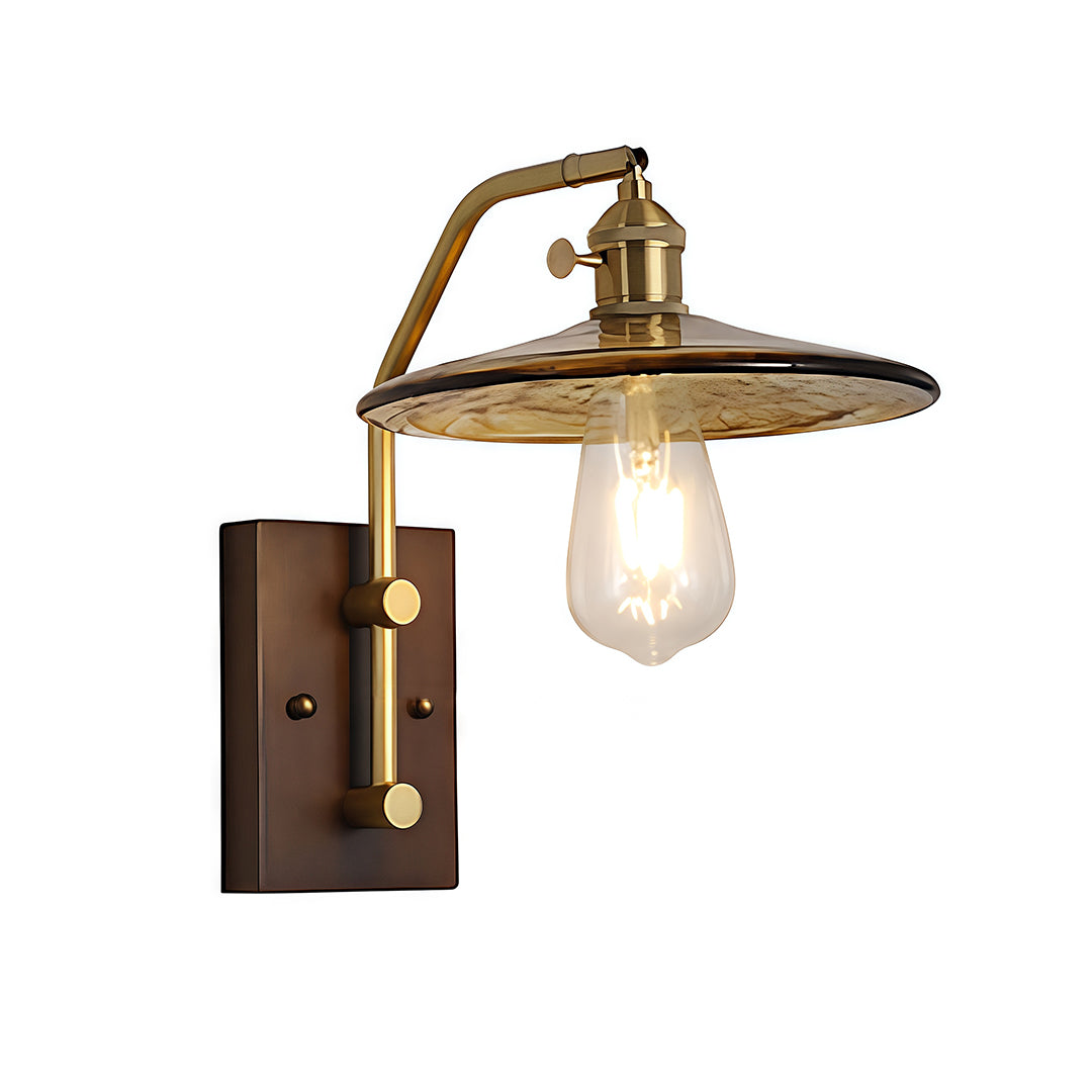 Isolated product shot of the adjustable brass glass wall lights with a dark wood wall mount and flat metal shade.