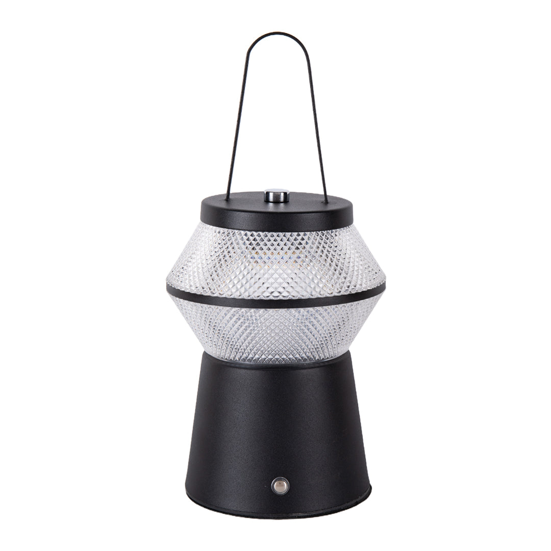 Isolated view of a black led outdoor solar lantern with a portable top handle and clear, patterned shade. 