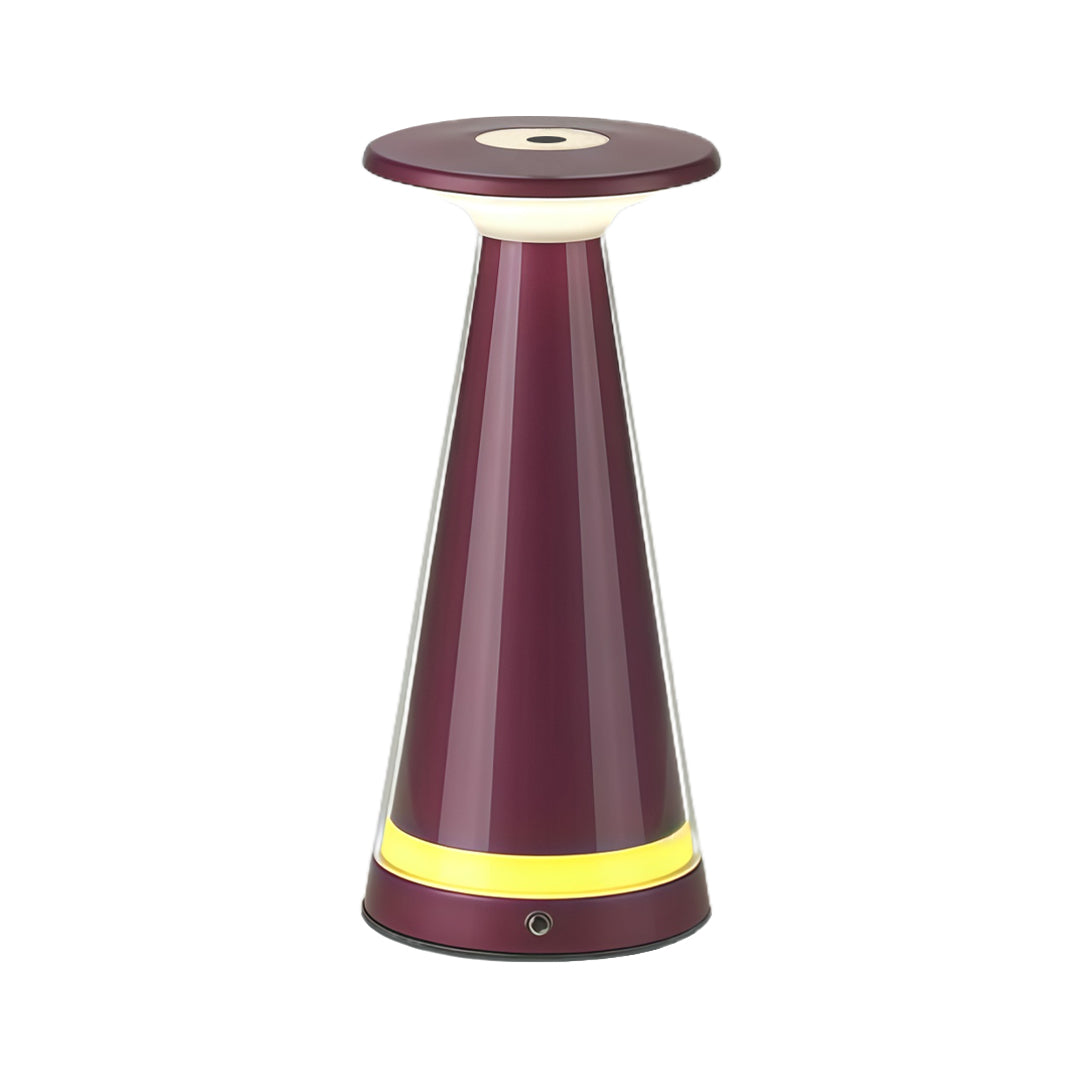 Isolated view of the deep burgundy vase table lamp with a gold collar, highlighting its unique color choice.