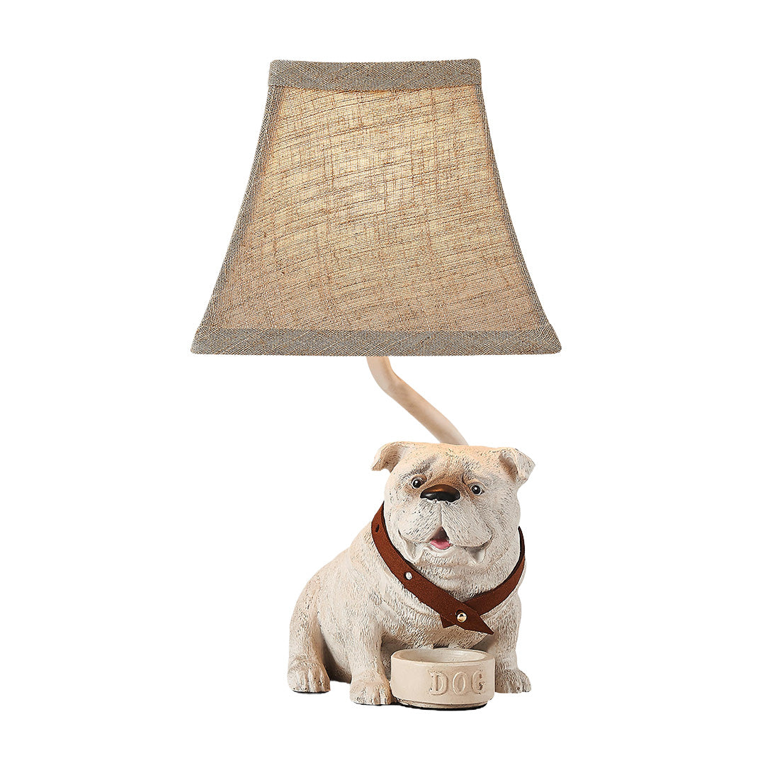 Isolated view of the dog table lamps, highlighting the resin base molded to show the dog's collar and small food bowl detail.