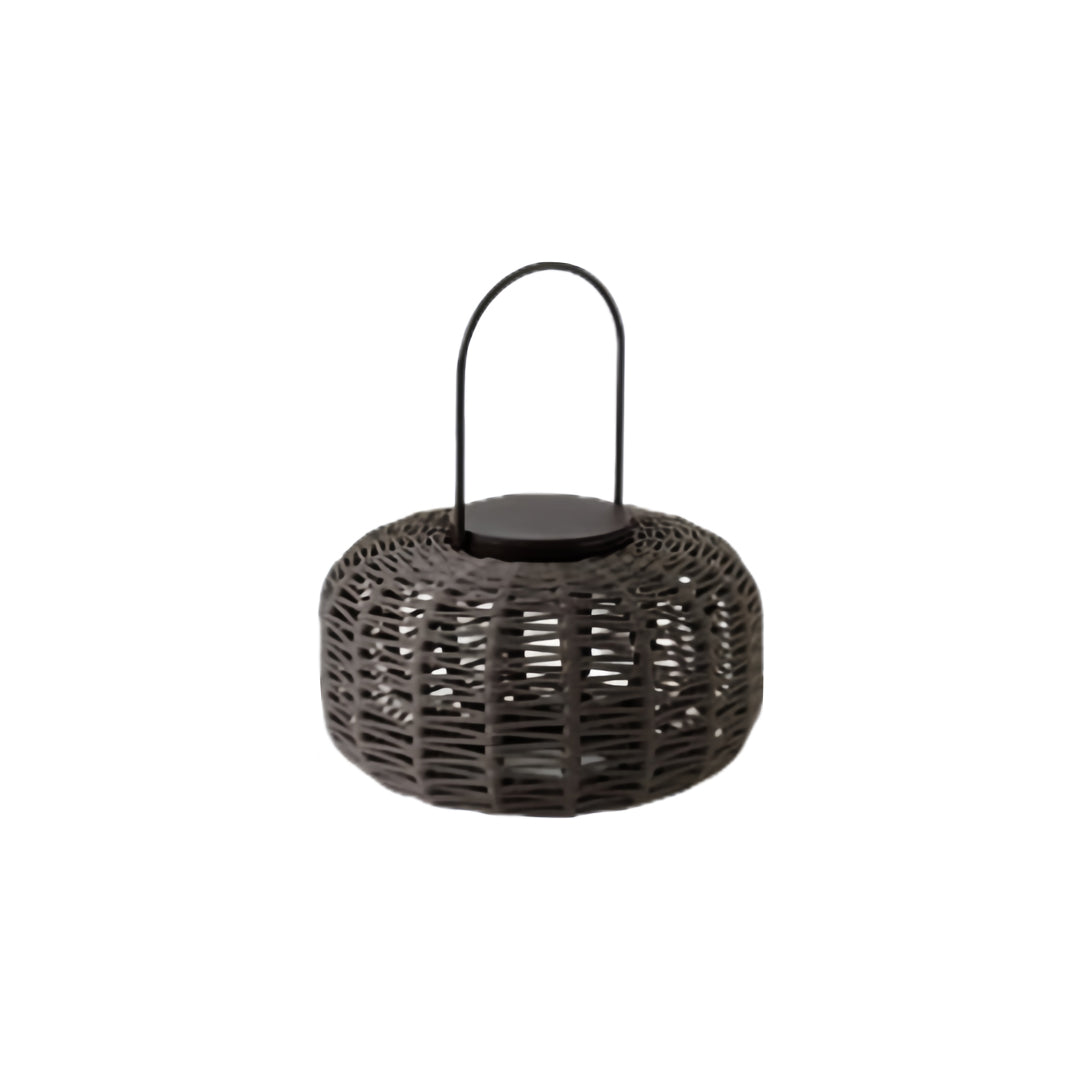 Isolated product view of the small outdoor LED lantern (dome shape), featuring a dark woven body and a black metal handle.