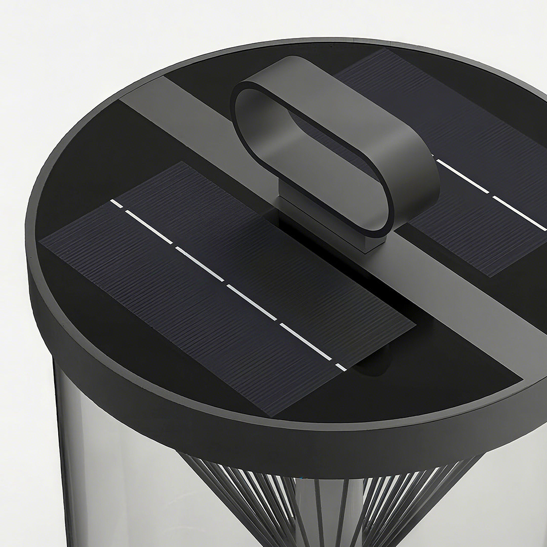 Isolated view of the house-shaped black outdoor lantern in the smallest size, showing the dark metal roof and diffused light panel.