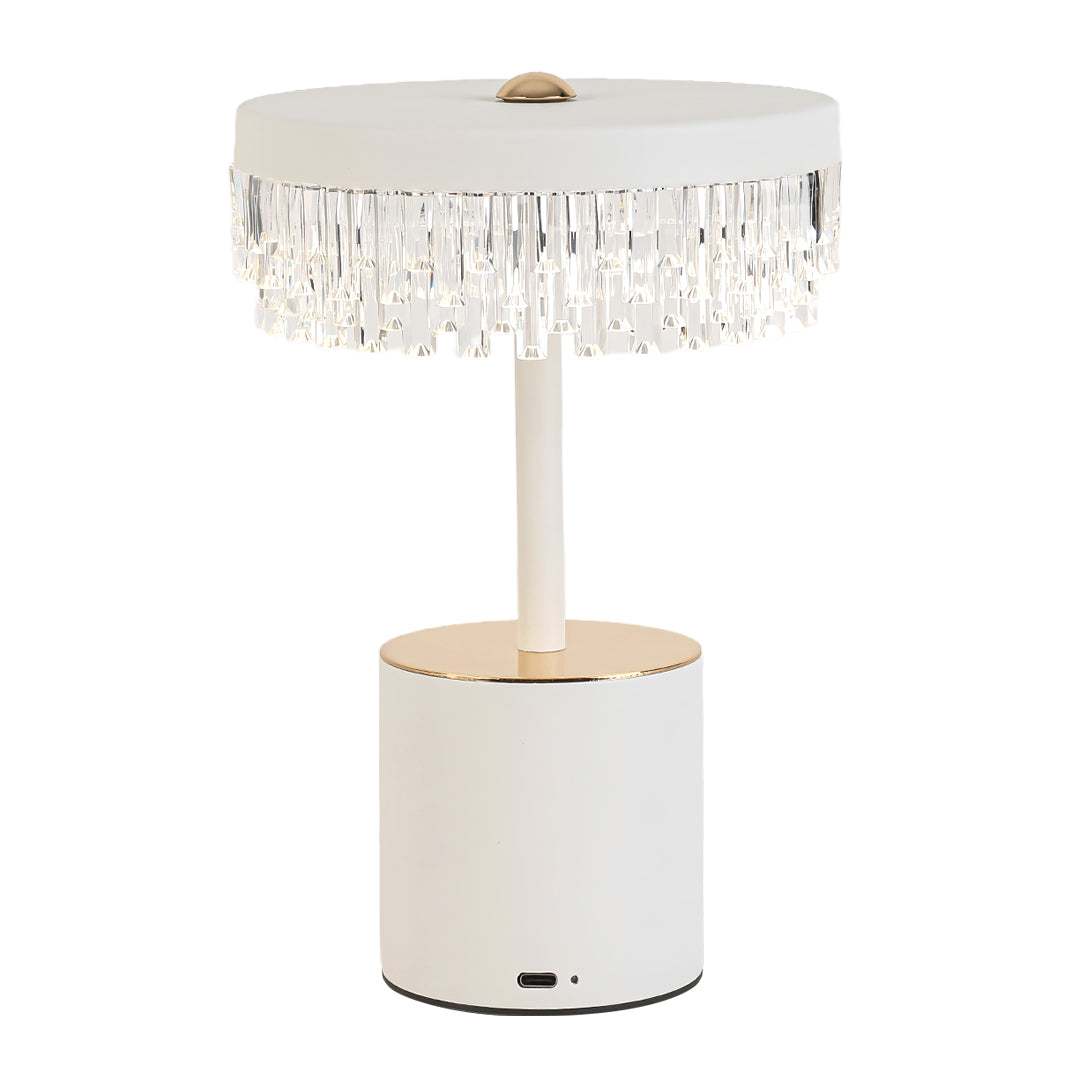 Isolated view of the white base fringe table lamp showcasing the vertical gold stem and cylinder base.