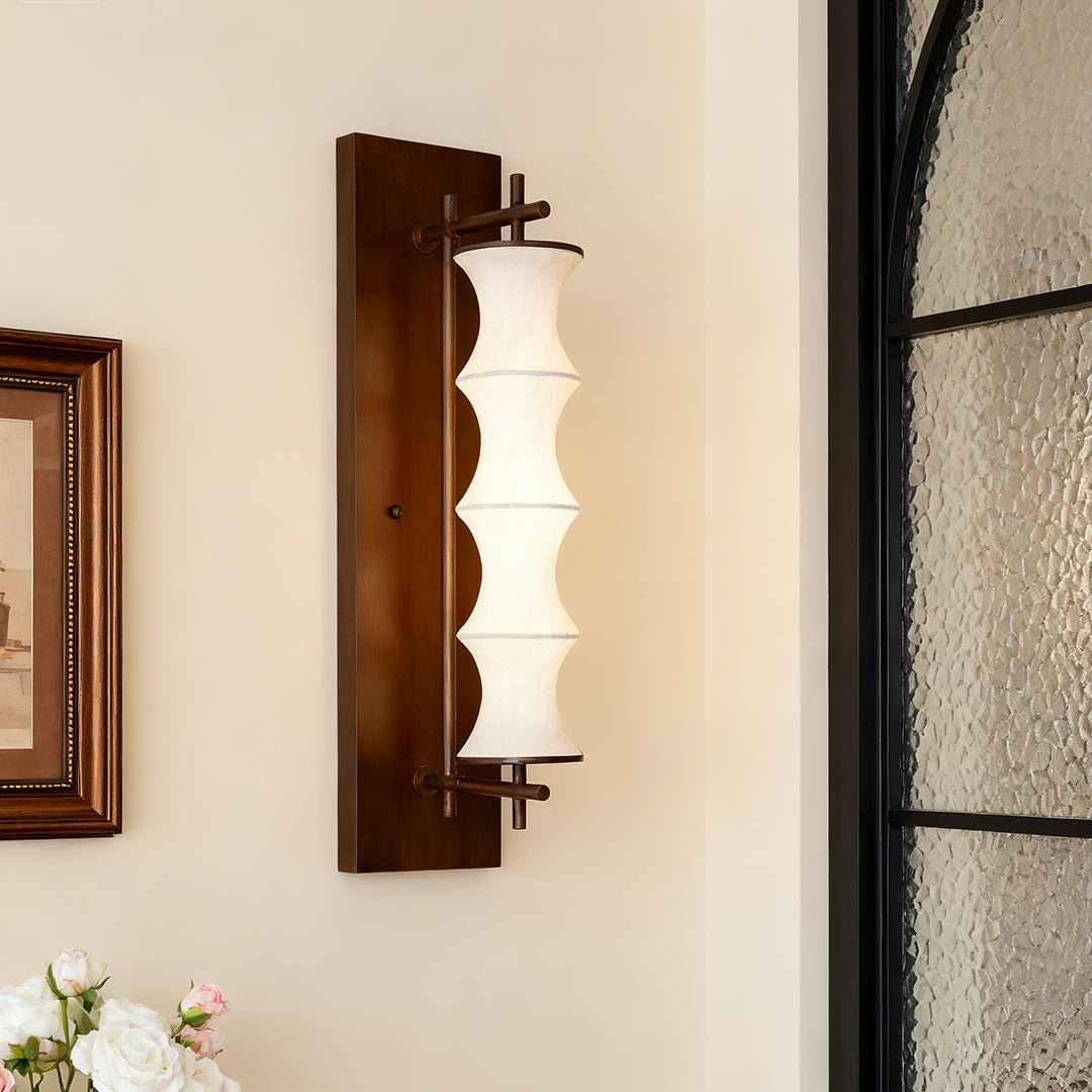 Japanese-inspired vintage light wall fixture featuring a long, rectangular dark brown panel and white wavy shade for ambient illumination.