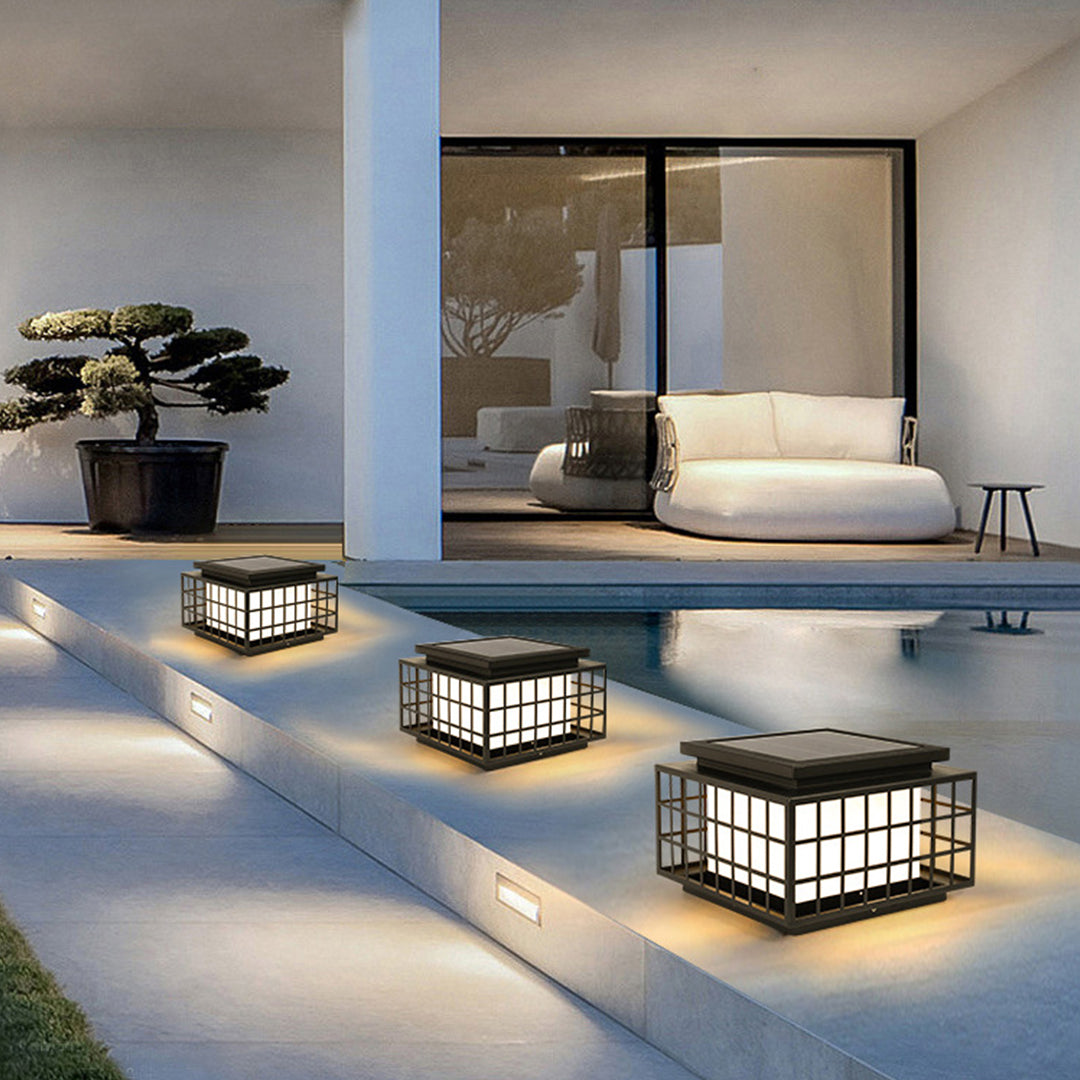 Modern Japanese-inspired solar lights arranged on contemporary patio creating zen-like atmosphere for outdoor relaxation