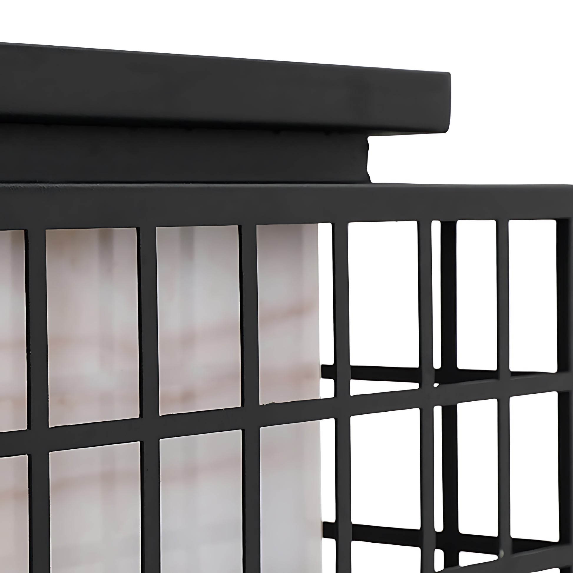 Close-up detail view of traditional Japanese lantern construction showing black frame and geometric grid pattern design