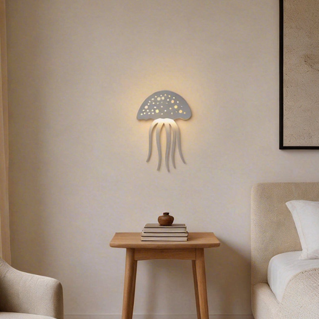 Jellyfish wall light mounted above bedside table in cozy bedroom.