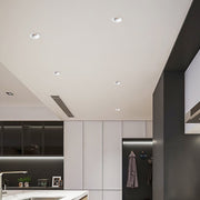 Contemporary kitchen featuring strategically placed ceiling round led lights for task and ambient lighting