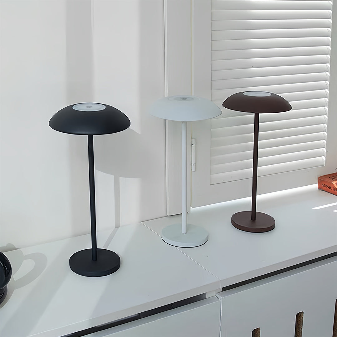 Contemporary kitchen counter with small black pendant light serving as practical table lamp