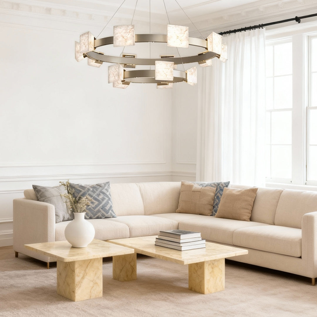 Bright living room featuring a circular kitchen island chandelier modern style with soft stone-textured lighting.