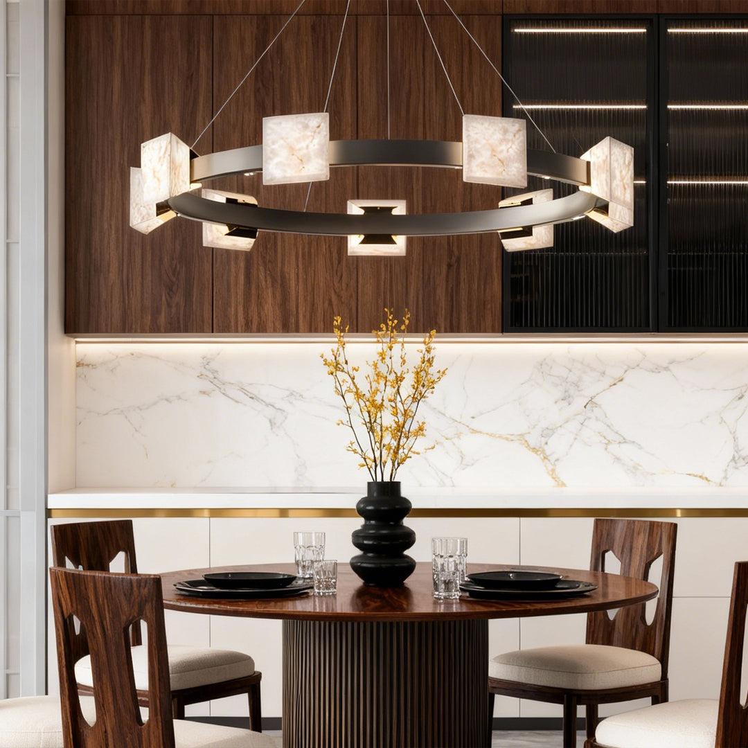 Bright living room featuring a circular kitchen island chandelier modern style with soft stone-textured lighting.