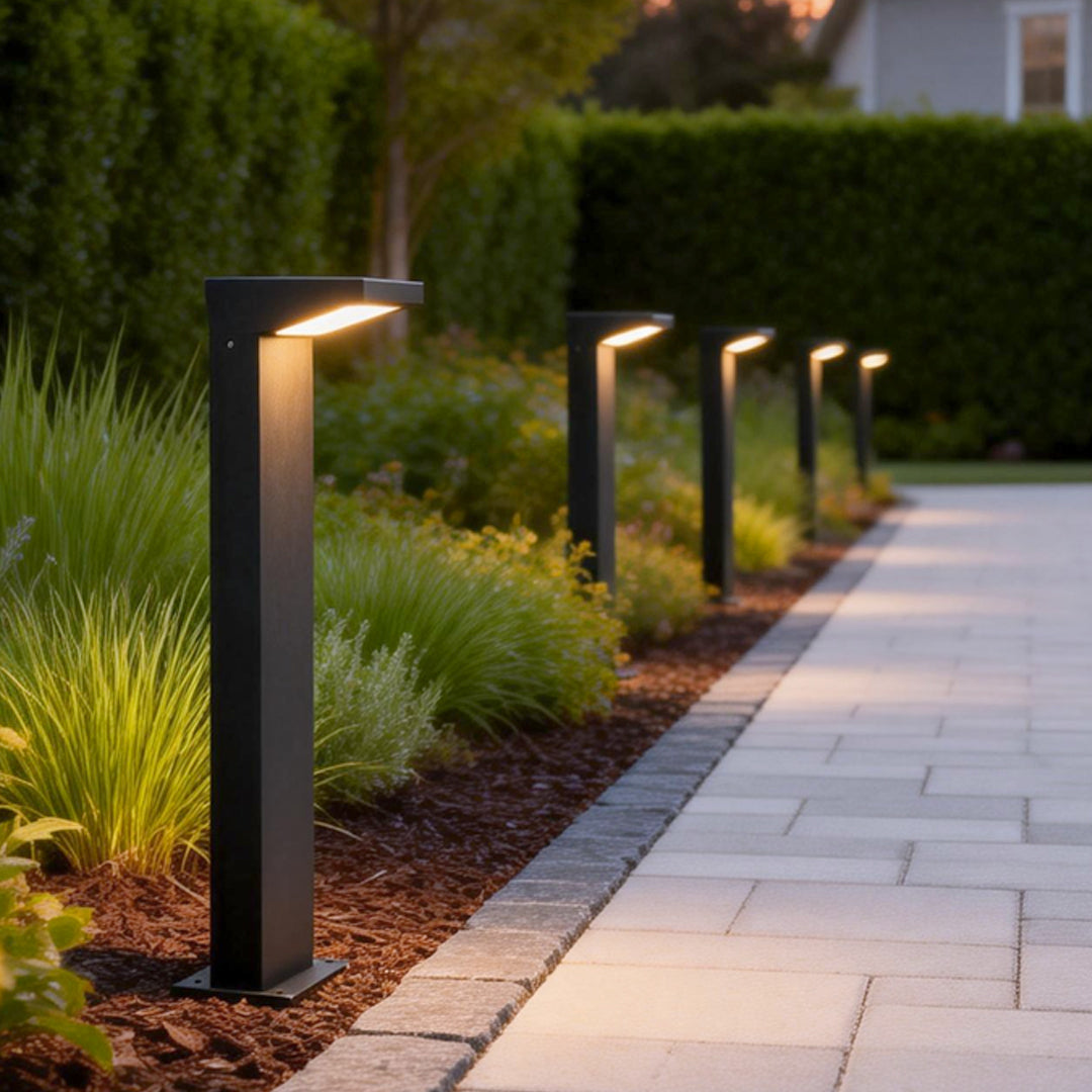 L bollard light enhancing a contemporary outdoor walkway with elegant ambient light.