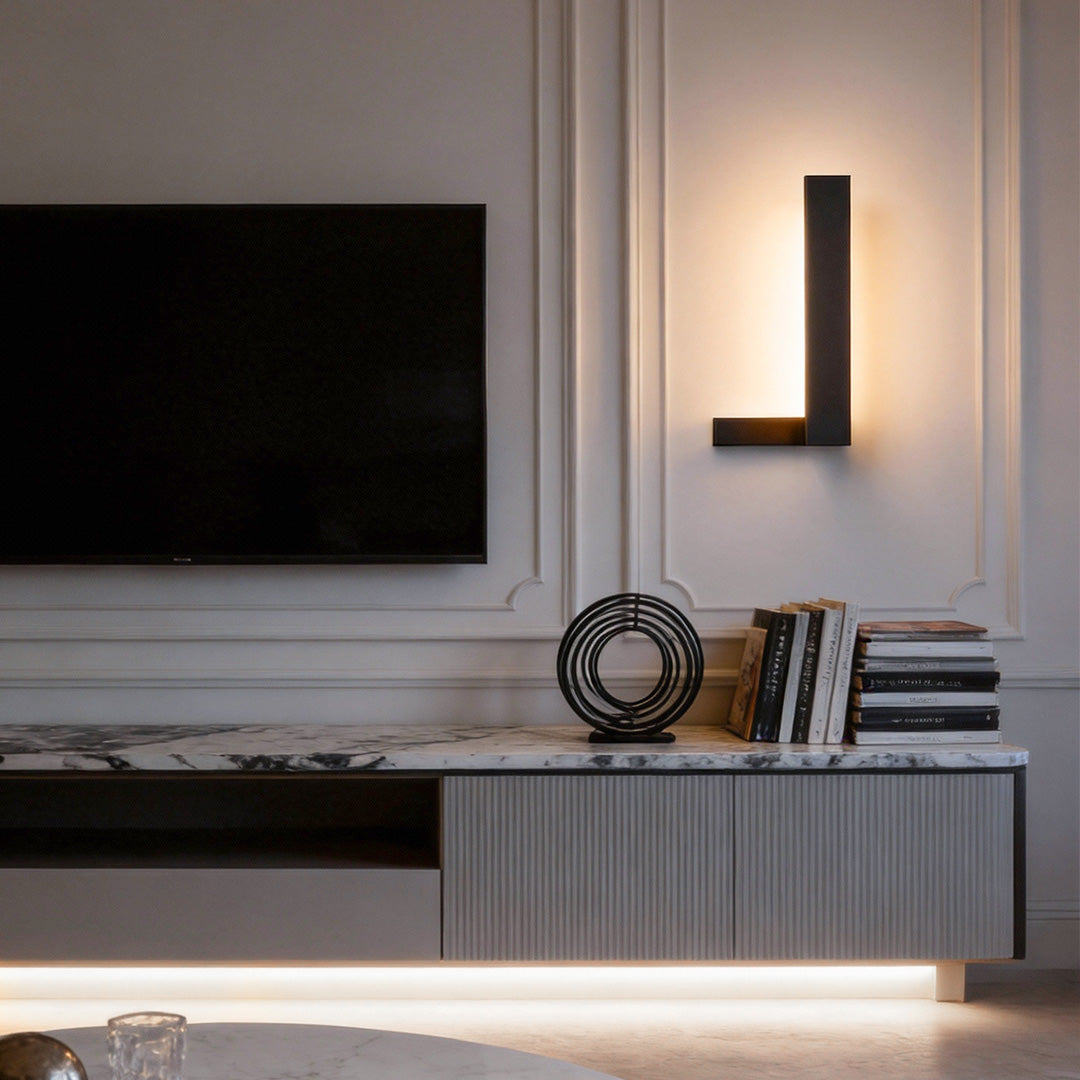 L shape wall light installed in a modern living room with ambient lighting.