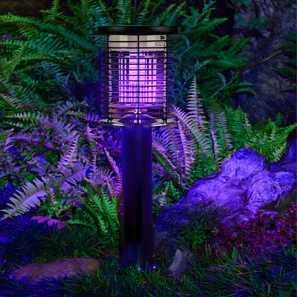 Lampara mata mosquitos with a black finish, providing insect-repelling light near plants.