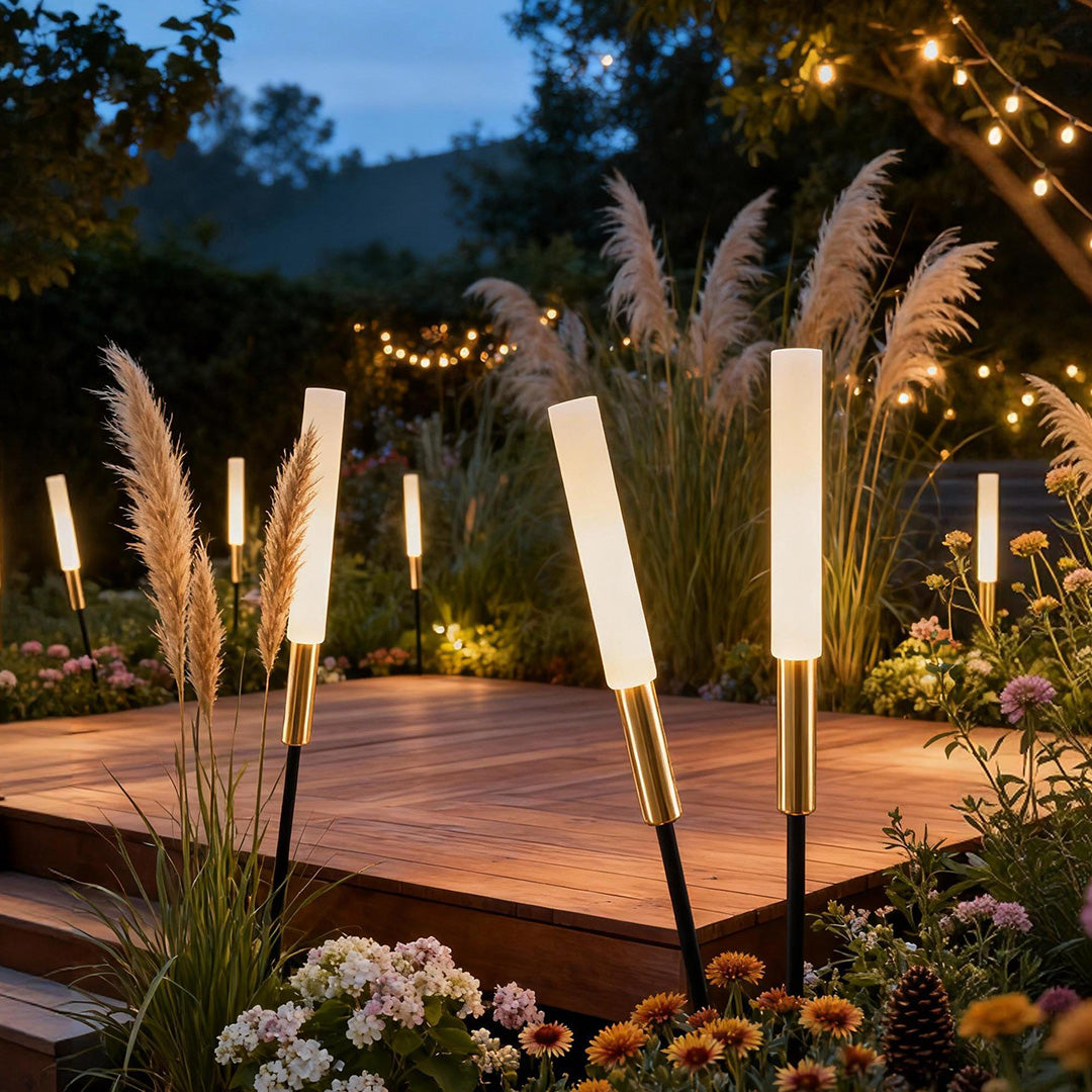 Landscape light spikes highlighting a garden pathway, providing soft and elegant illumination for evening landscapes.