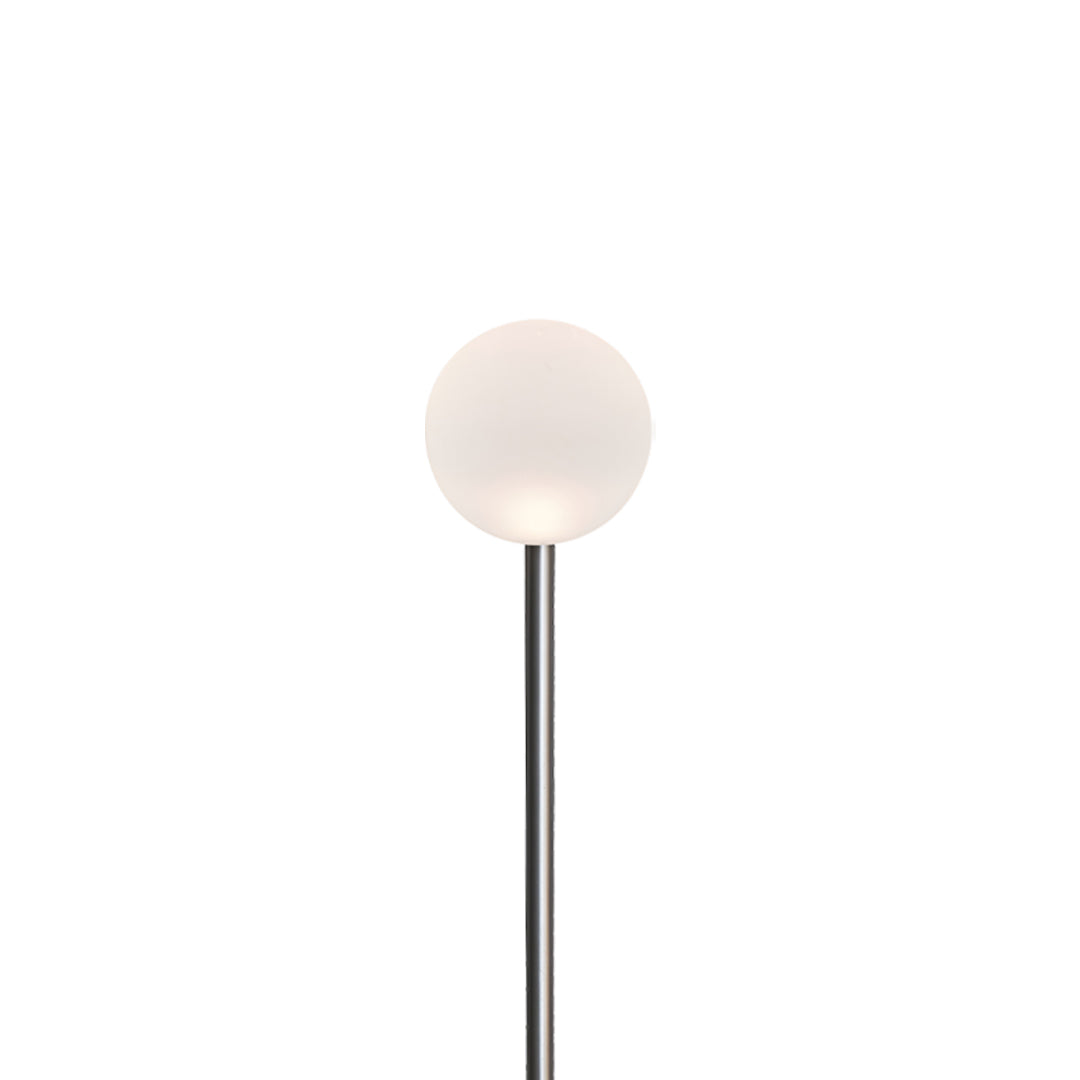 A soft-white round globe outdoor pathway post providing clean ambient lighting for contemporary landscape lighting pathway settings.