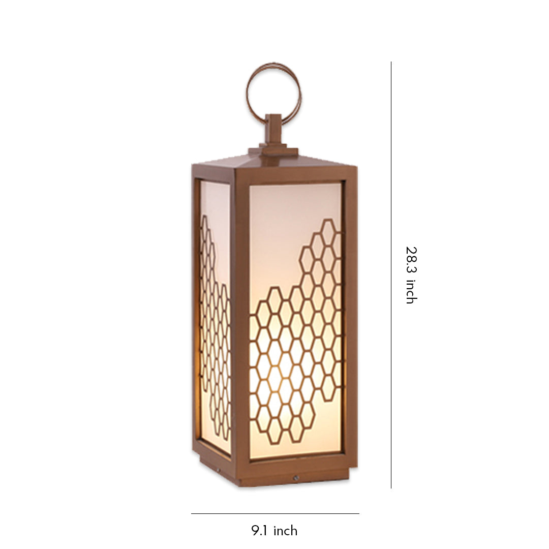 Modern decorative lantern-style bollard lighting with warm glow and patterned metal frame.