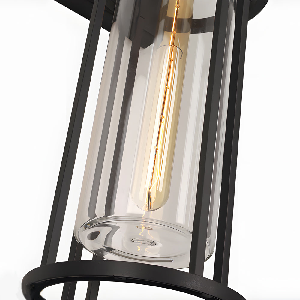 Interior view of lantern fixture displaying Edison bulb and clear glass cylinder components
