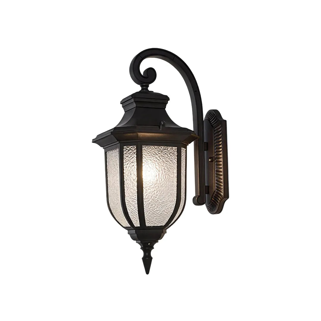 Lantern outdoor wall lights featuring a traditional black frame and clear seeded glass shade.
