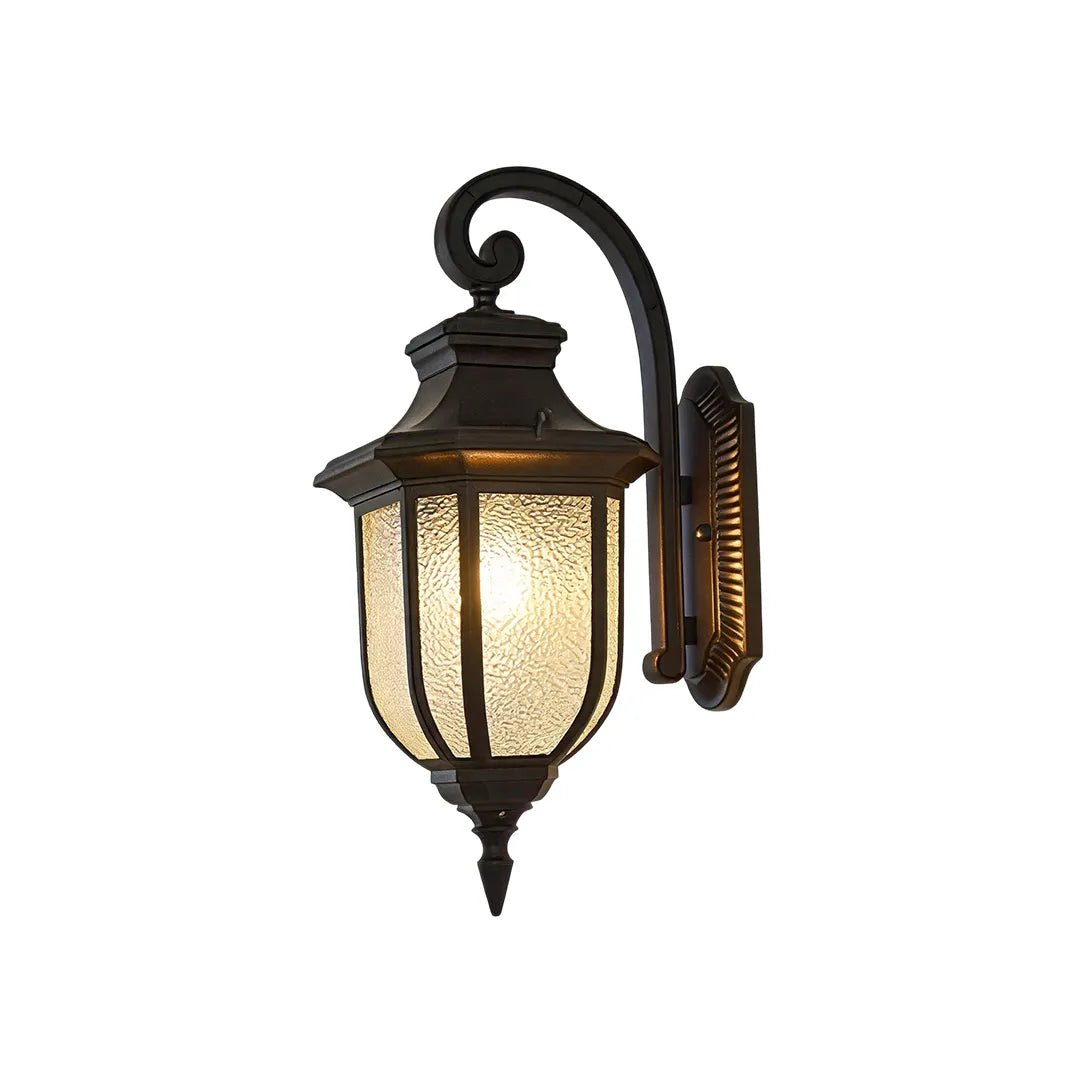 Lantern outdoor wall lights with warm illumination through seeded glass and a decorative curved arm.