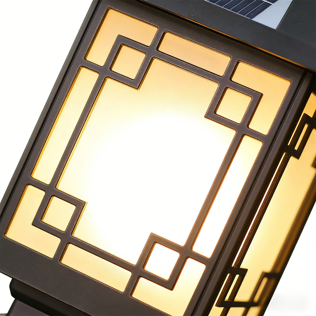 Lantern pillar lights front panel close-up emphasizing symmetrical grid design and soft illumination.