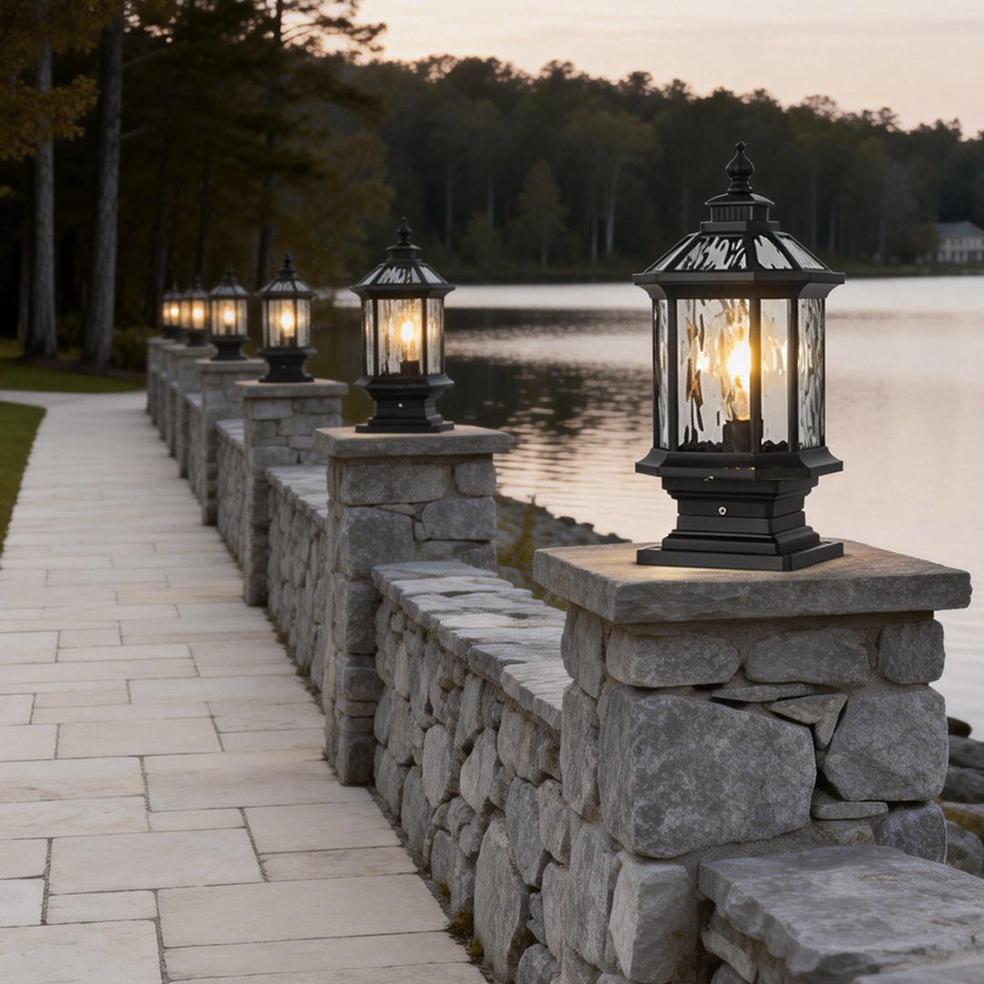 Lantern pillar lights along a lakeside pathway, casting a soft light for evening strolls.