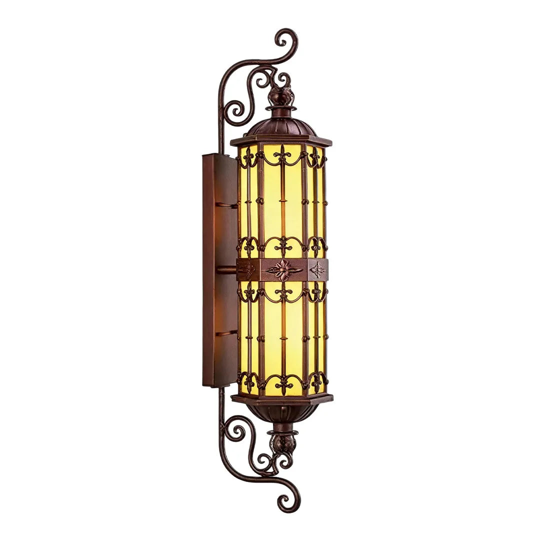 Vintage wall sconce lighting with a tall lantern shape, decorative metalwork, and warm illumination.