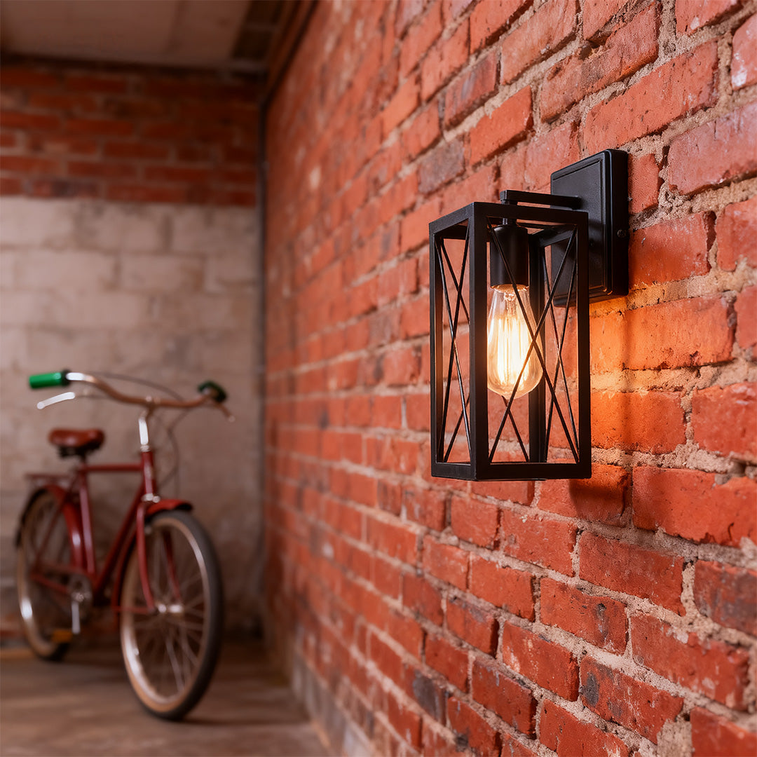 Lantern wall light above a side table with candles, adding a rustic charm to the interior.