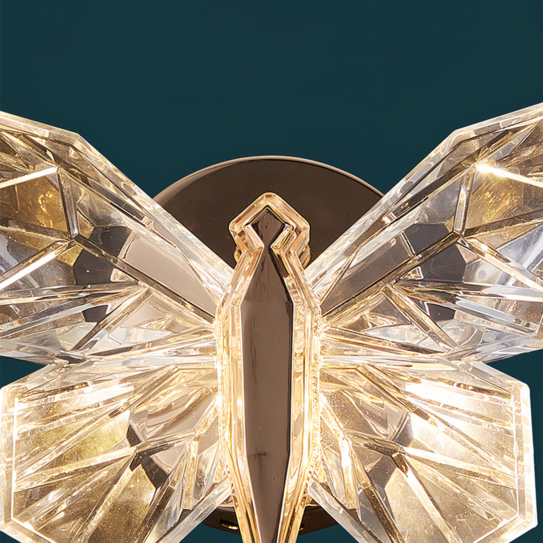 Large decorative butterfly wall light with intricate wing details and premium crystalline finish
