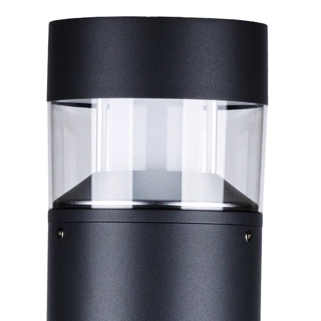 Modern cylindrical light with large clear center section and black top and bottom caps