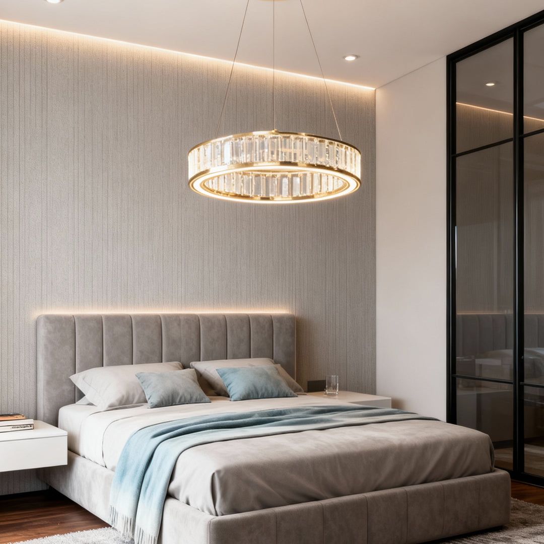 Large crystal chandeliers illuminating contemporary bedroom with tufted gray bed and textured wall creating elegant ambiance