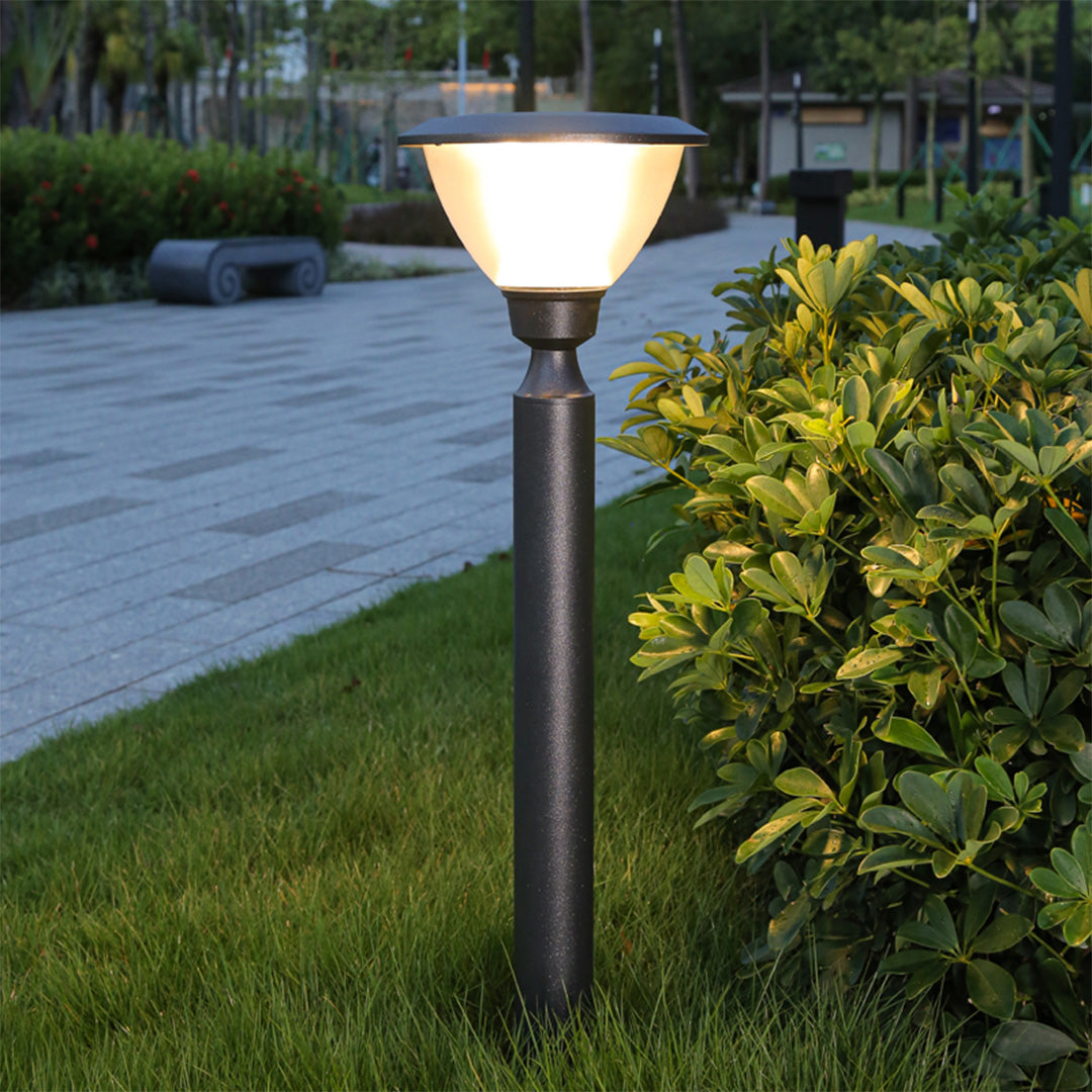 Tall black post light with traditional design and white frosted bowl luminaire