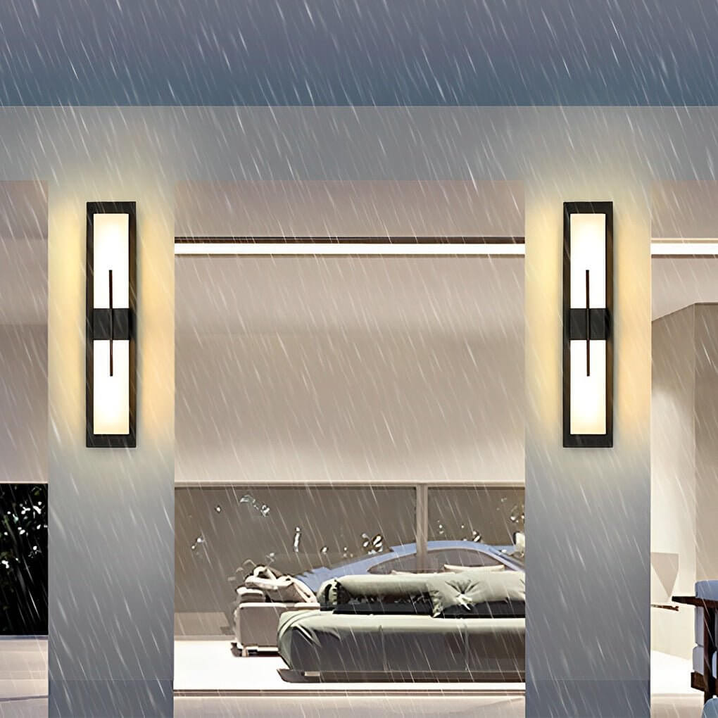 Large outdoor wall light fixtures with black frame, illuminating a contemporary outdoor space.