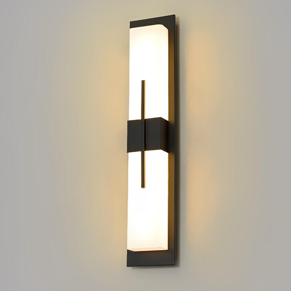 Large outdoor wall light fixtures providing focused light near a modern building.