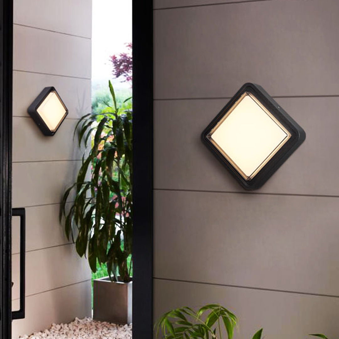 Black square wall light fixture with clean frame design and integrated LED panel
