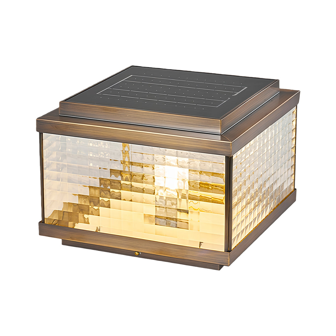 Square pillar cap light with layered horizontal glass design creating warm ambient outdoor illumination