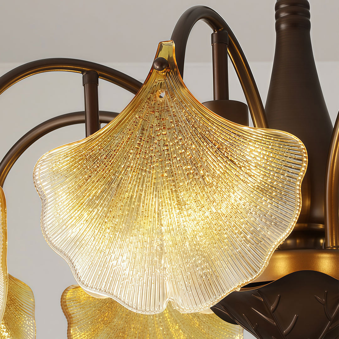 Close-up of leaf glass chandelier highlighting the textured amber glass leaf shade.
