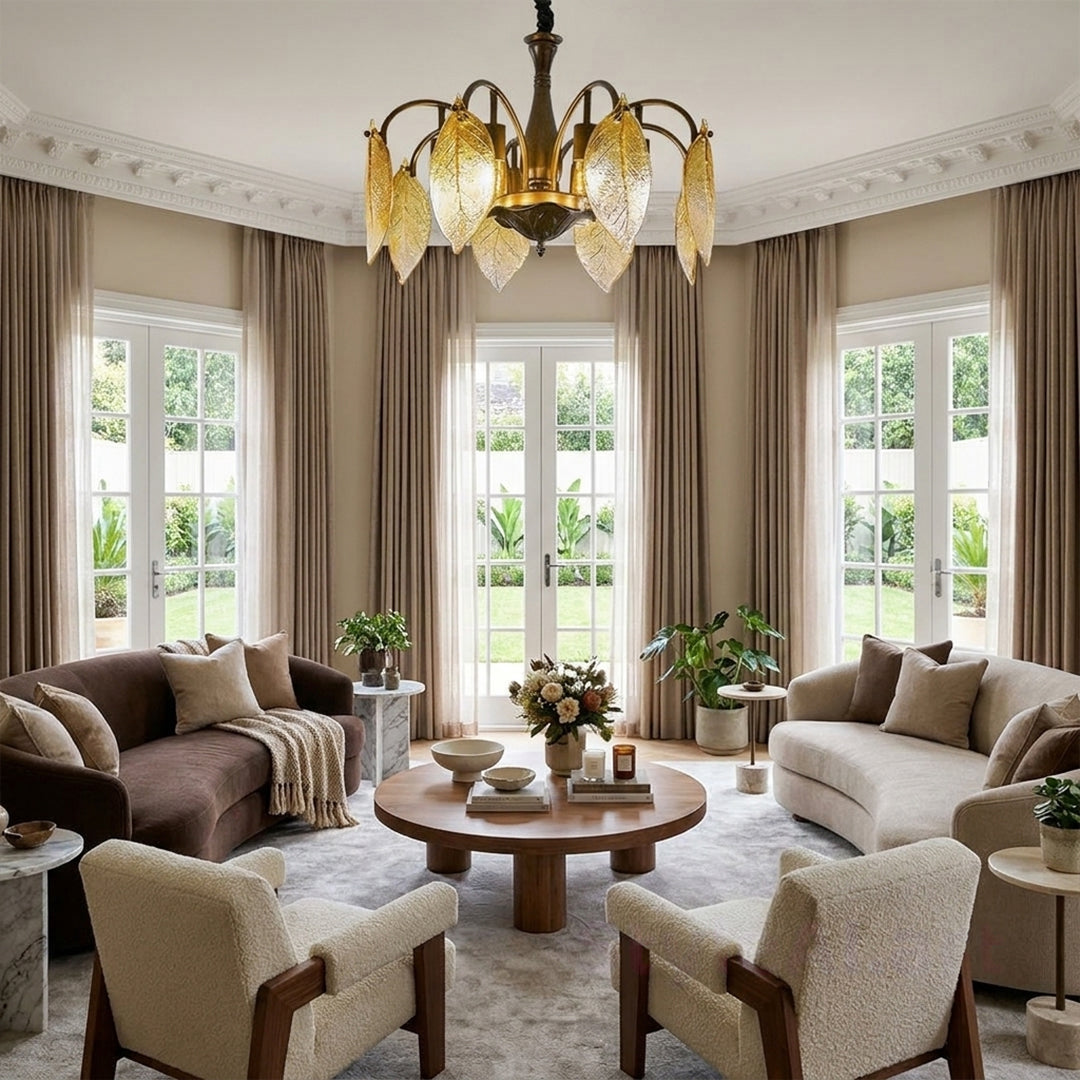 Leaf glass chandelier hanging above a sitting area with elegant vintage styling.