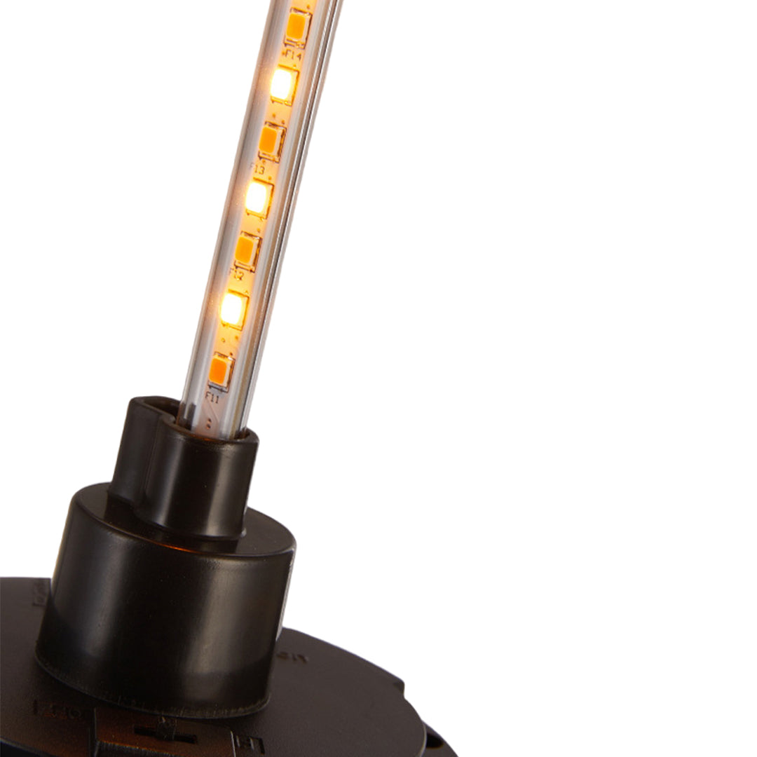 LED bulb component detail showing warm light technology in solar fixture