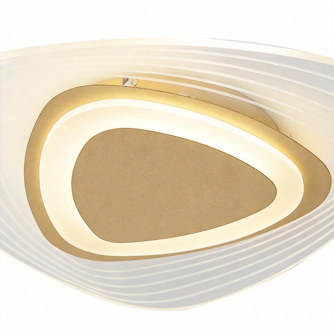 Close-up view of the layered lighting design of triangle led ceiling lights.