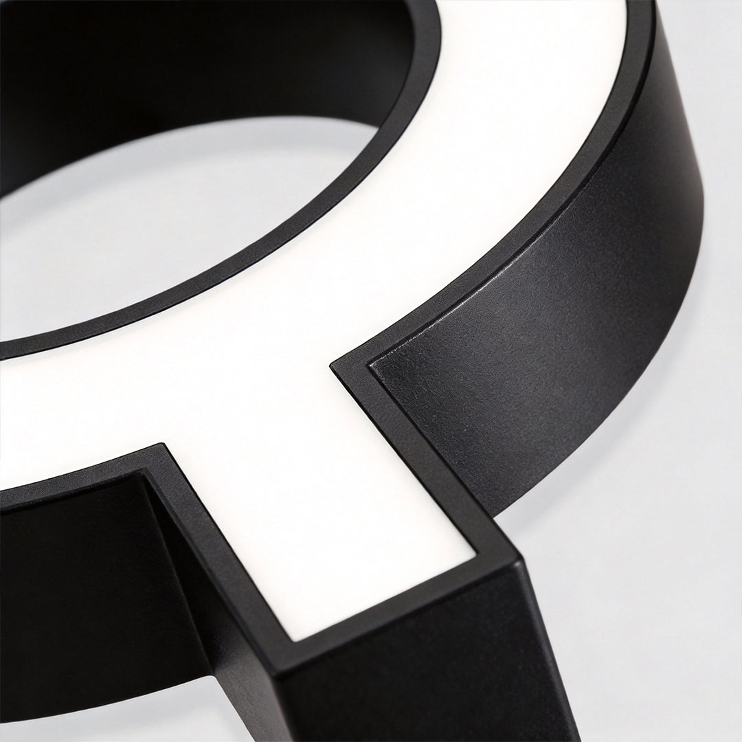 Close-up detail of led chandelier modern showing curved black metal frame with integrated LED diffuser and smooth finish.