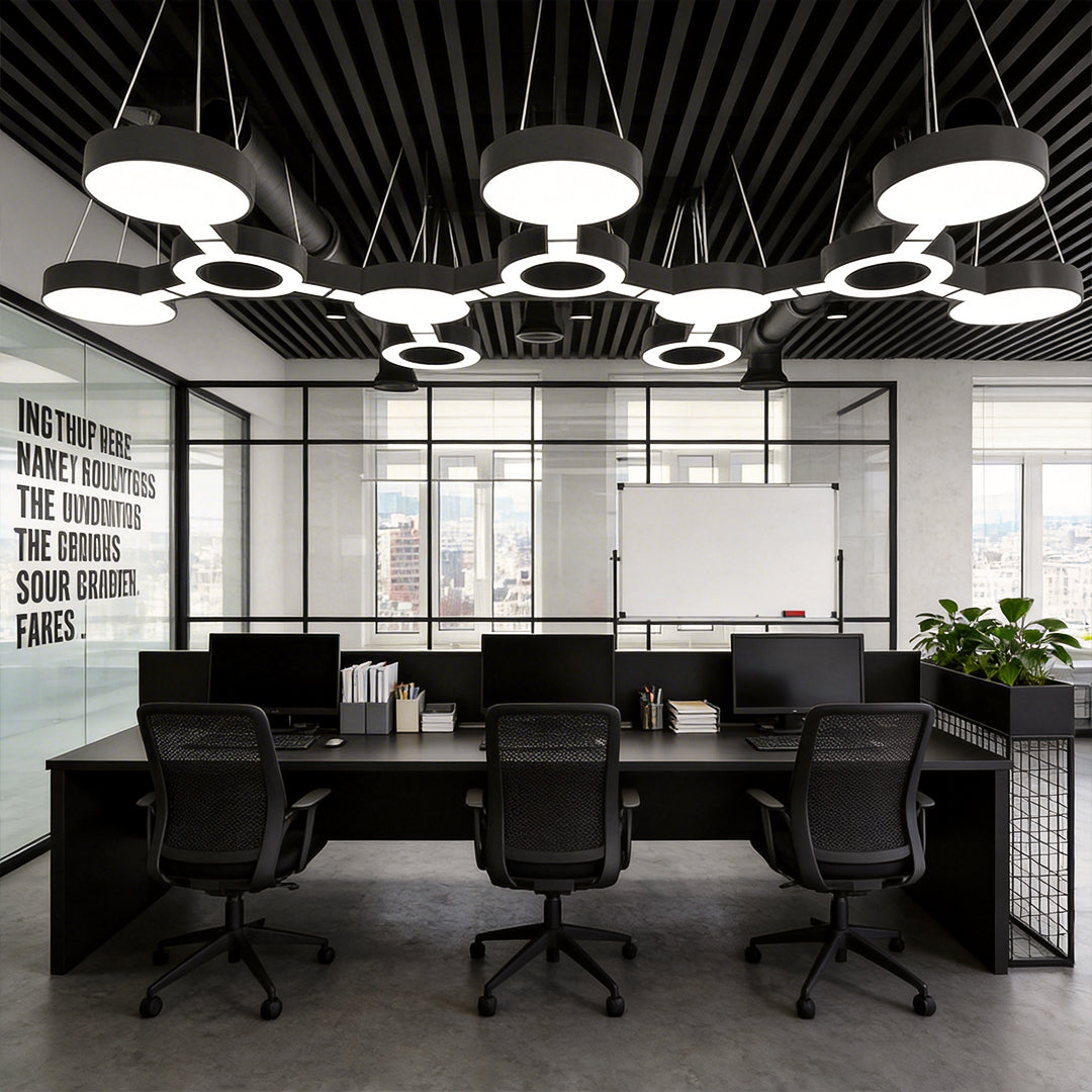 Led chandelier modern installed in an open-plan office, featuring circular LED modules that create uniform lighting for collaborative workspaces.