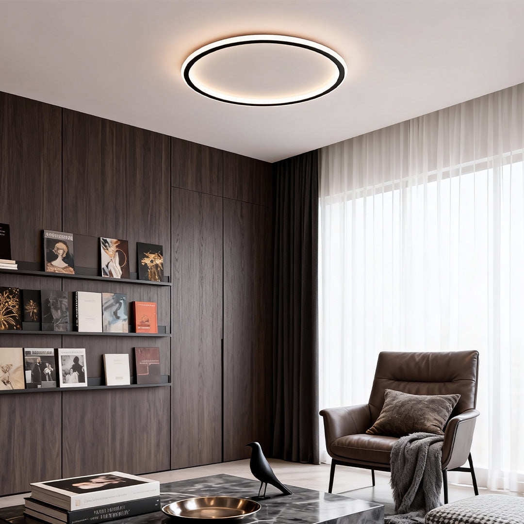 Modern living room with a recessed led circle ceiling lamp creating soft ambient lighting.